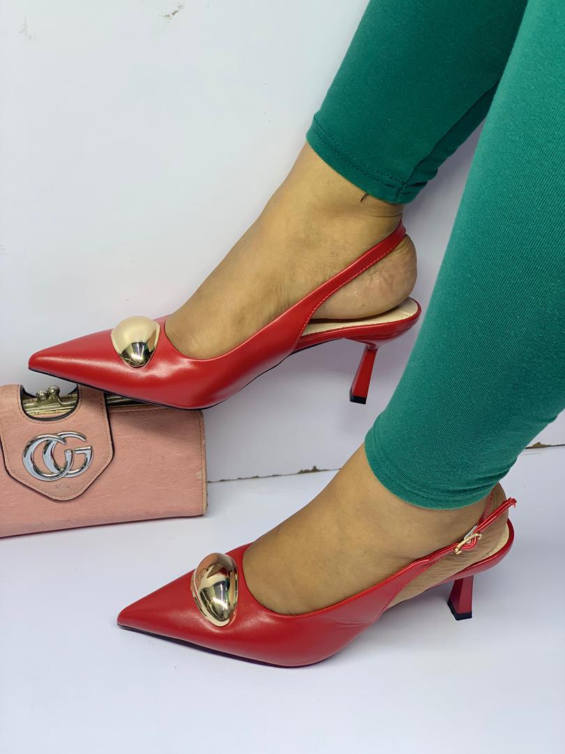  beige pointed-toe slingback pumps