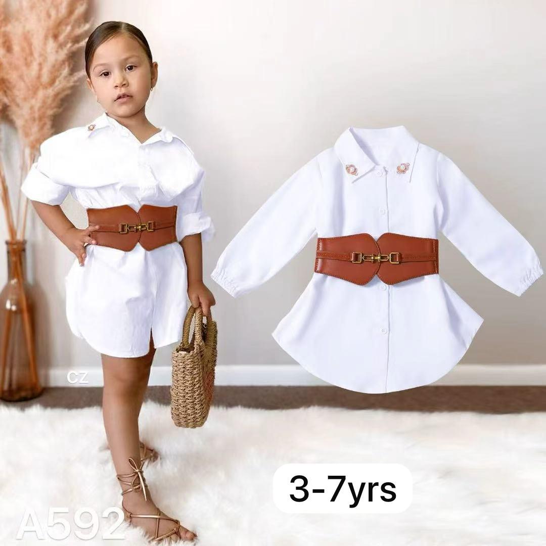 girl's white button-down shirt dress with a brown waist belt. 